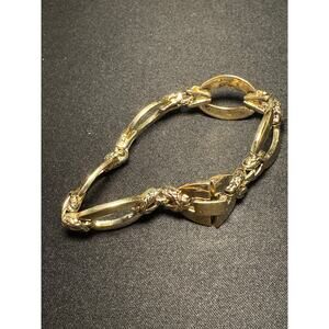 Vintage Monet Gold Tone Fold Over Clasp Bracelet